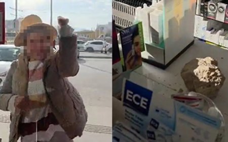 Fark ücreti vermek istemeyen kadın eczaneye taşla saldırdı